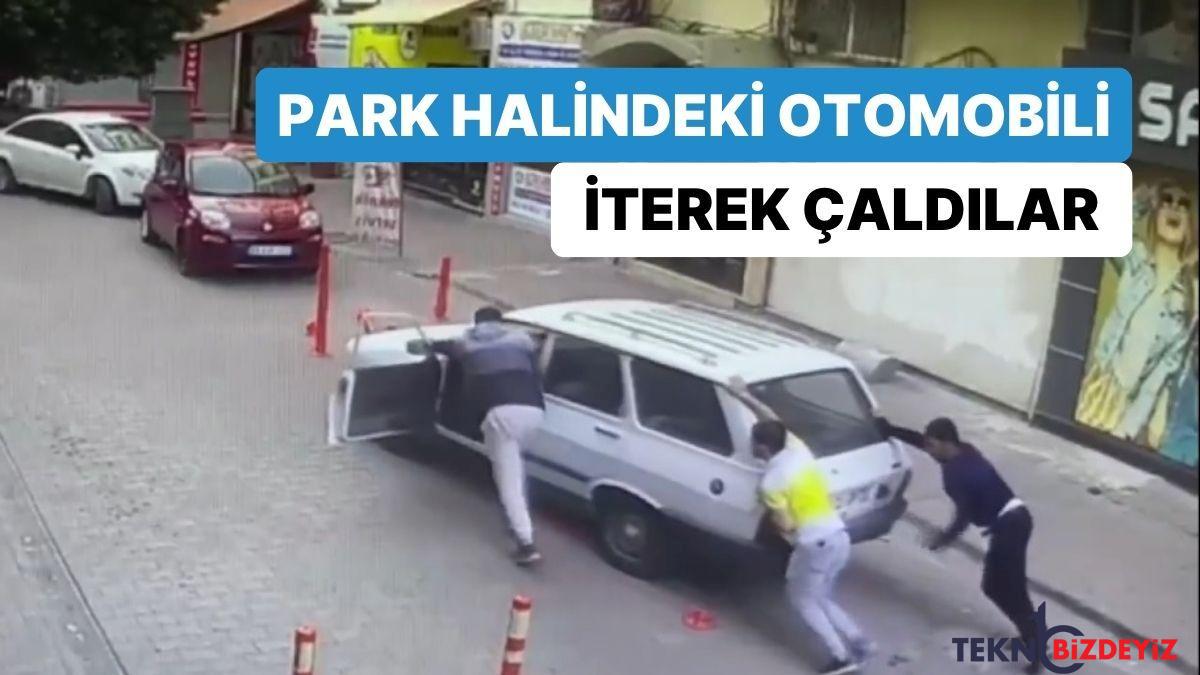 park halindeki arabasi iterek caldilar s7MK4aRD